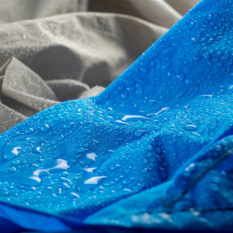 How Are Backpacks Made — Waterproof Fabric with Water Drops.