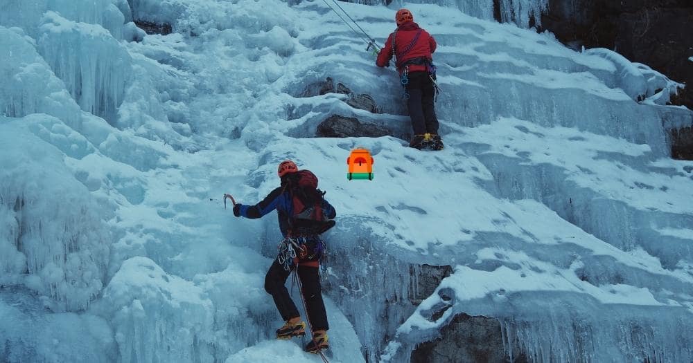 Black Diamond Speed 40 Backpack Review — Men Climbing on Frozen Waterfall.