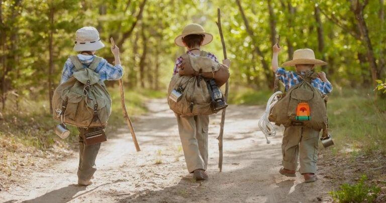 Hiking Backpack for Beginners — Boys on a Forest Road with Backpacks.