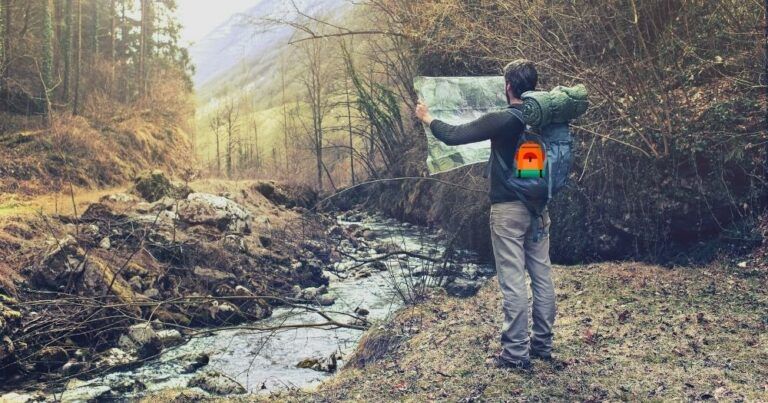 How to Avoid Getting Lost While Hiking — Lost Man Observing Map to Find the Right Way.