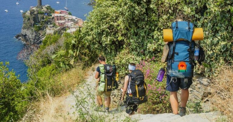 How to Choose the Right Backpack for Hiking — Hikers Walking toward Vernazza.