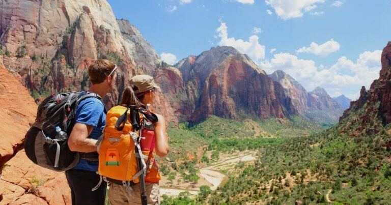 How to Lighten Your Hiking Backpack — Hikers Looking at View Zion National Park.