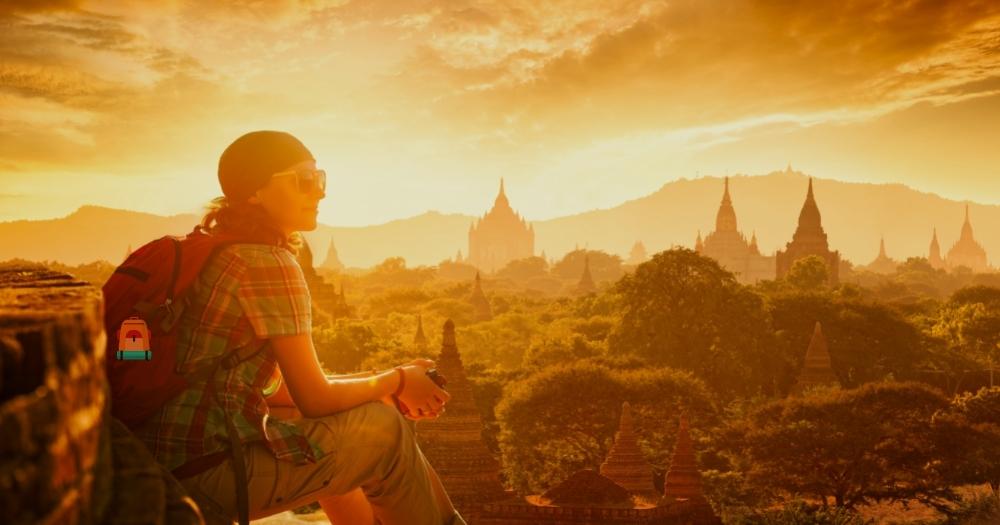 Must-Have Backpack — Woman Backpacker Enjoying Looking at the Sunset.