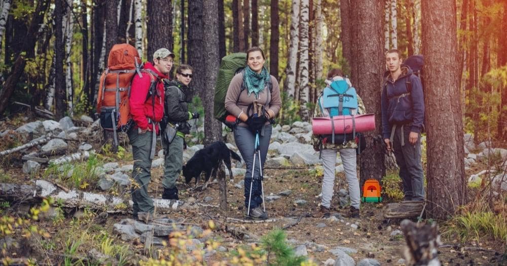 Teton Sports Explorer Review — Group of Friends with Backpacks in the Forest.
