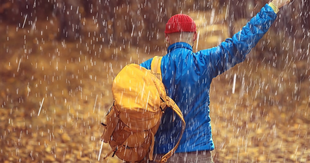 A Man on a Hike on a Bad and Cold Weather Day.